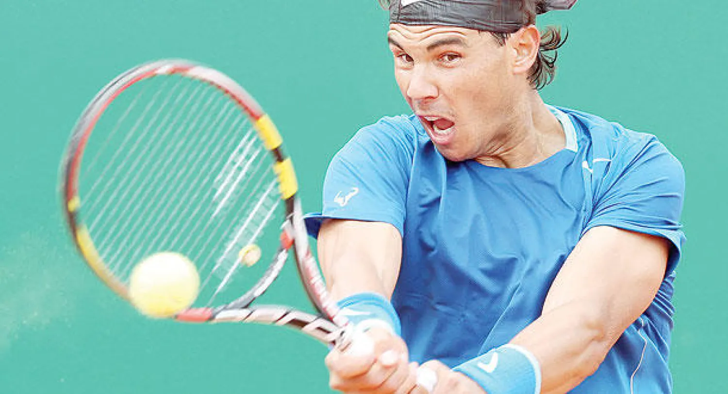 نادال خلال مواجهته مع الروسي تيموراز (إ.ب.أ)