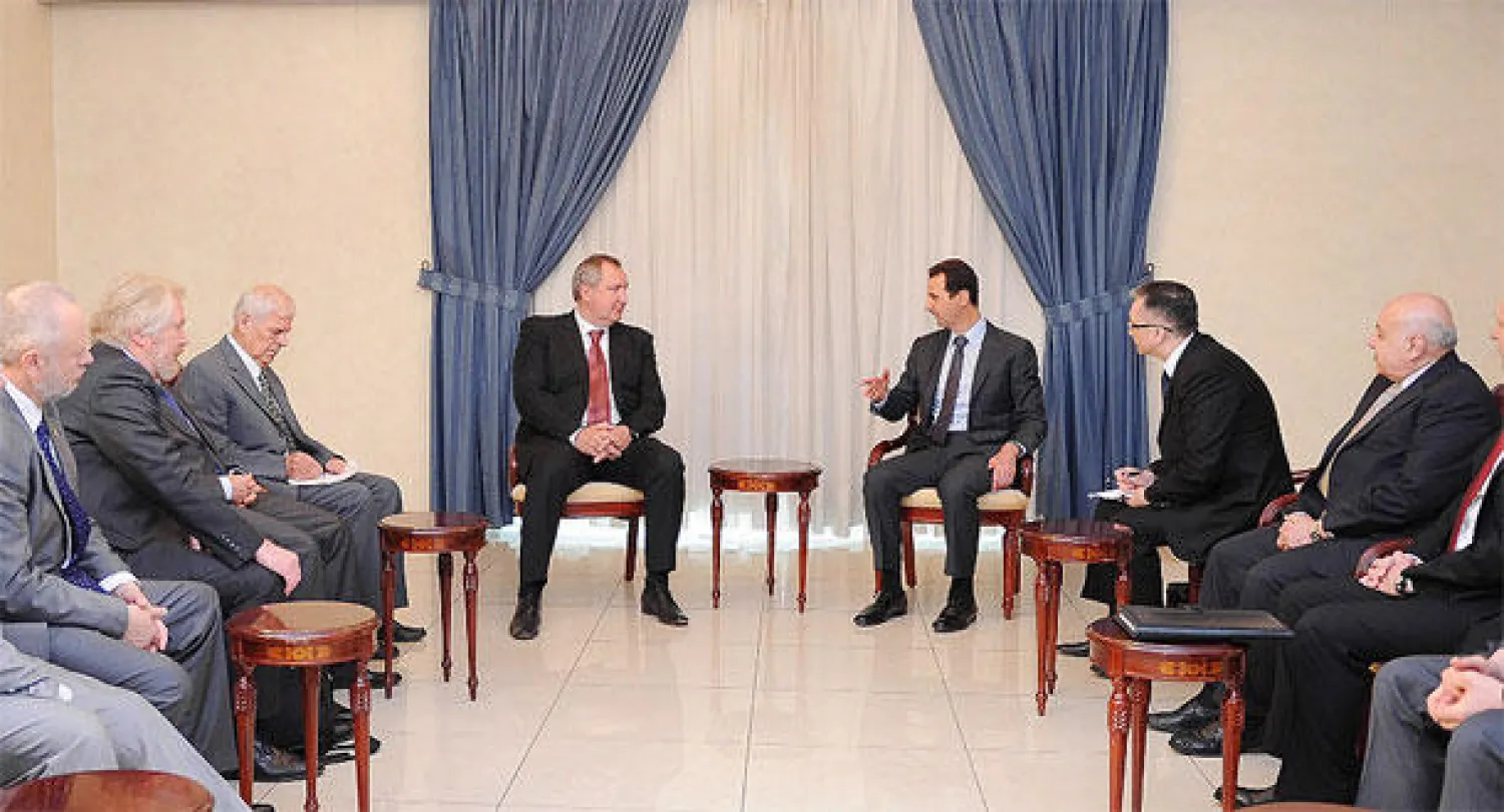 وفد روسي يلتقي الأسد وسط تحذيرات من ضربة غربية