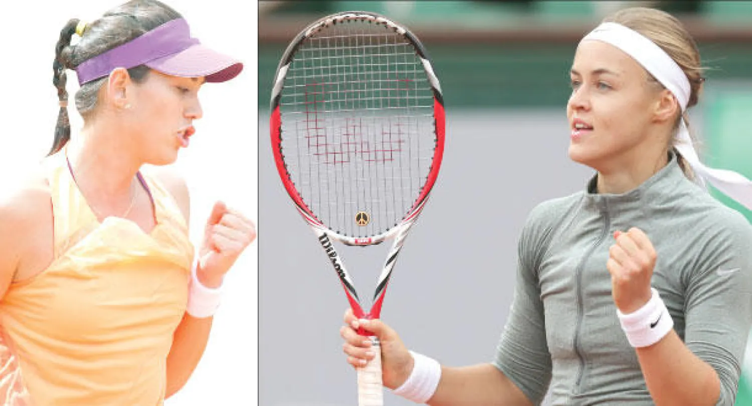 السلوفاكية أنا كارولينا شمييدلوفا أطاحت بفينوس (أ.ب)  -  الإسبانية غاربين موغوروزا أطاحت بسيرينا (إ.ب.أ)