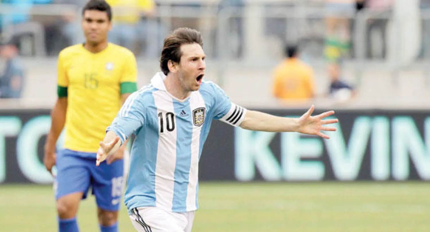 عشاق النجم الأرجنتيني ميسي في انتظار ما سيفعله في مونديال البرازيل