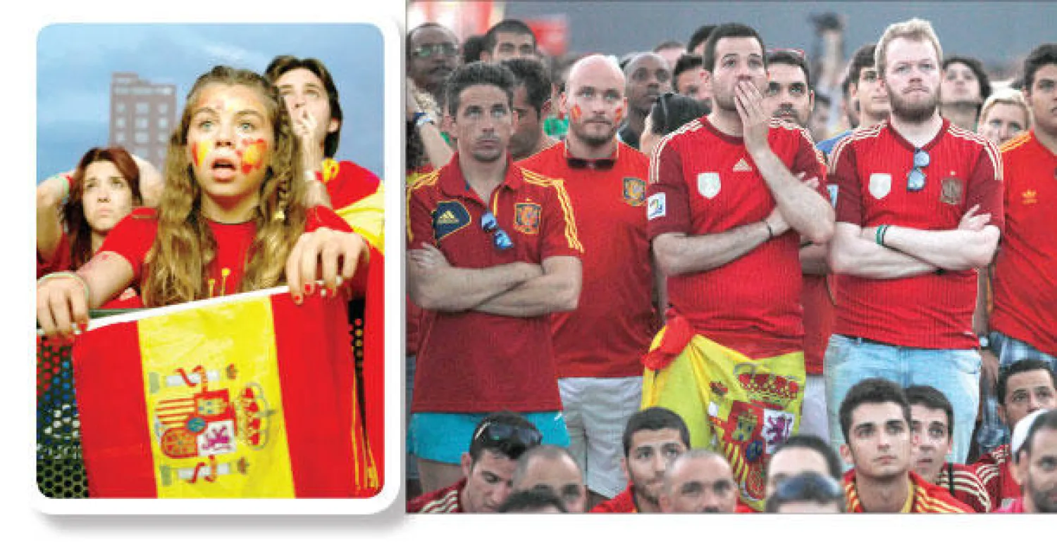 أحزان اسبانية (أ.ب) و إسبانيا تعيش في ذهول  (أ.ب)