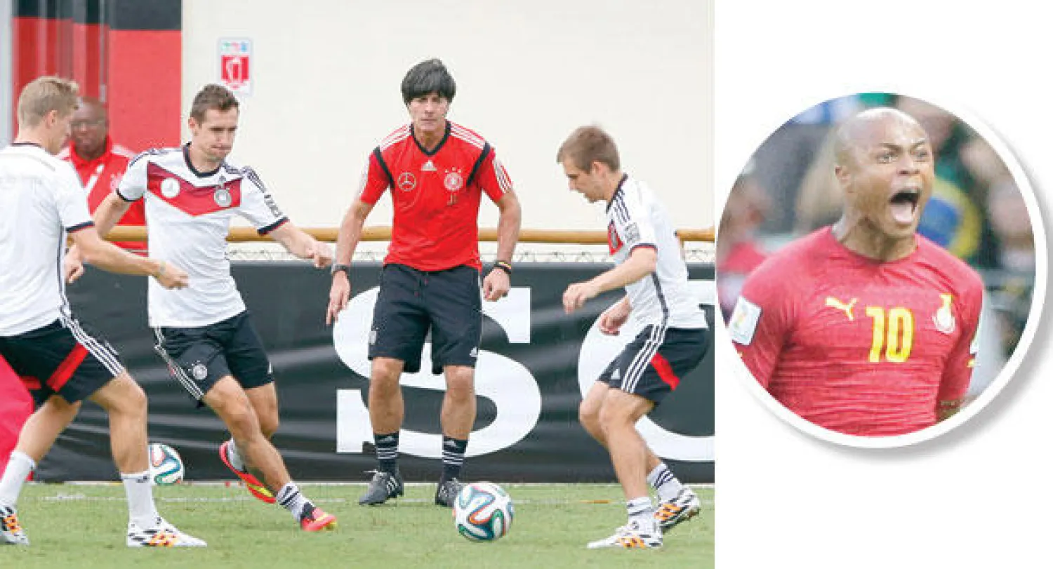 الغاني أندريه أيو تألق أمام ألمانيا (أ.ب)   -  لوف يقود تدريبات ألمانيا قبل مواجهة الولايات المتحدة (أ.ب)
