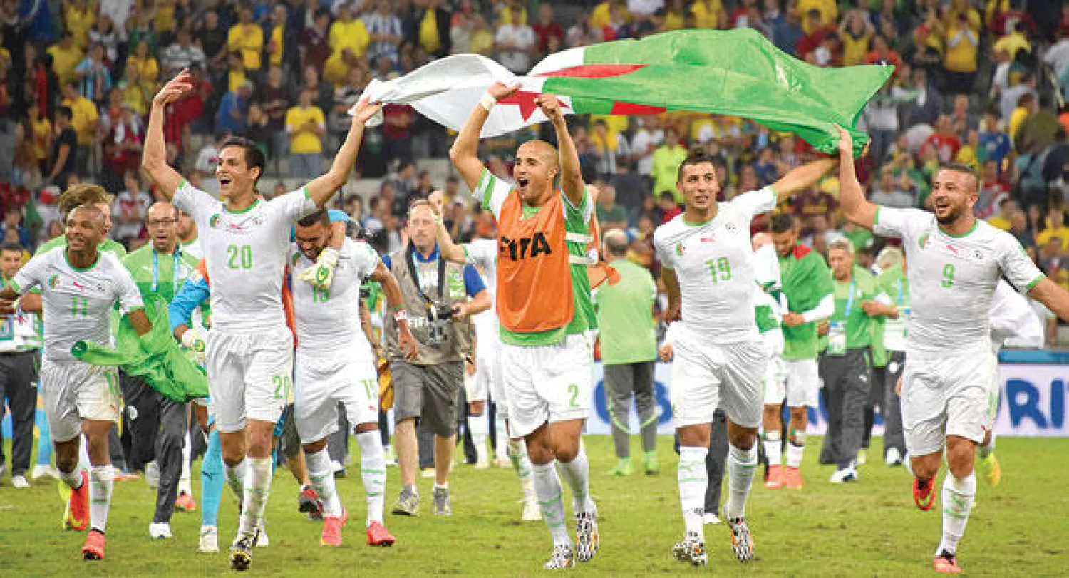 فرحة لاعبي الجزائر بعد التأهل التاريخي (أ.ف.ب)