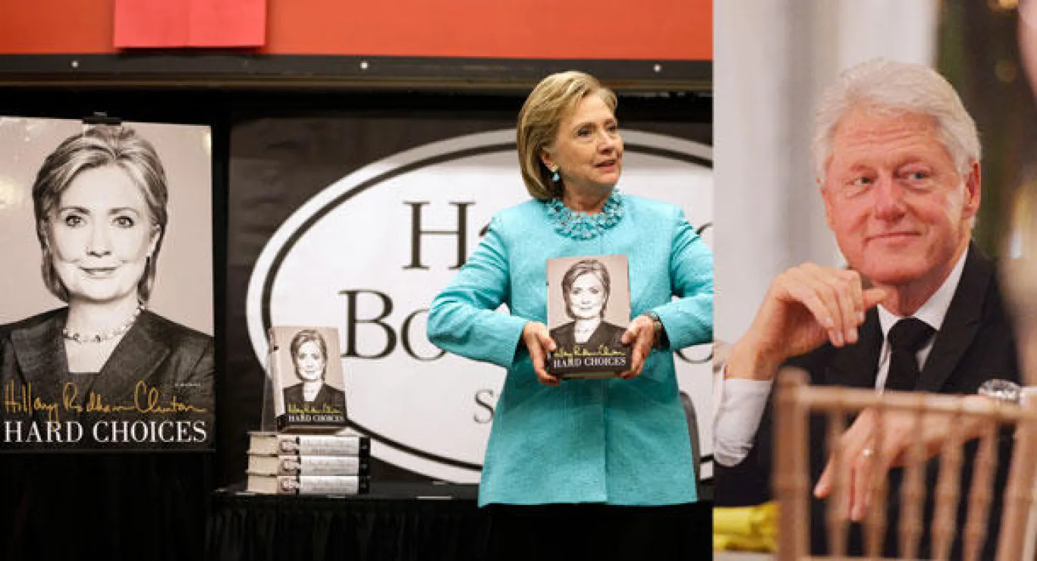 الرئيس الأميركي الأسبق بيل كلينتون (أ.ف.ب)  -  هيلاري كلينتون تمسك بإحدى نسخ كتابها {خيارات صعبة} خلال حفل أقيم في مكتبة جامعة هارفارد (أ.ب)