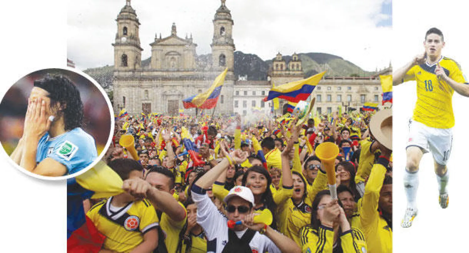 جيمس رودريغيز   -  احتفالات الجماهير الكولومبية الصاخبة في العاصمة بوغوتا تحولت إلى اشتباكات درامية (أ.ب)  -  آثار الهزيمة على ملامح كافاني مهاجم الأوروغواي