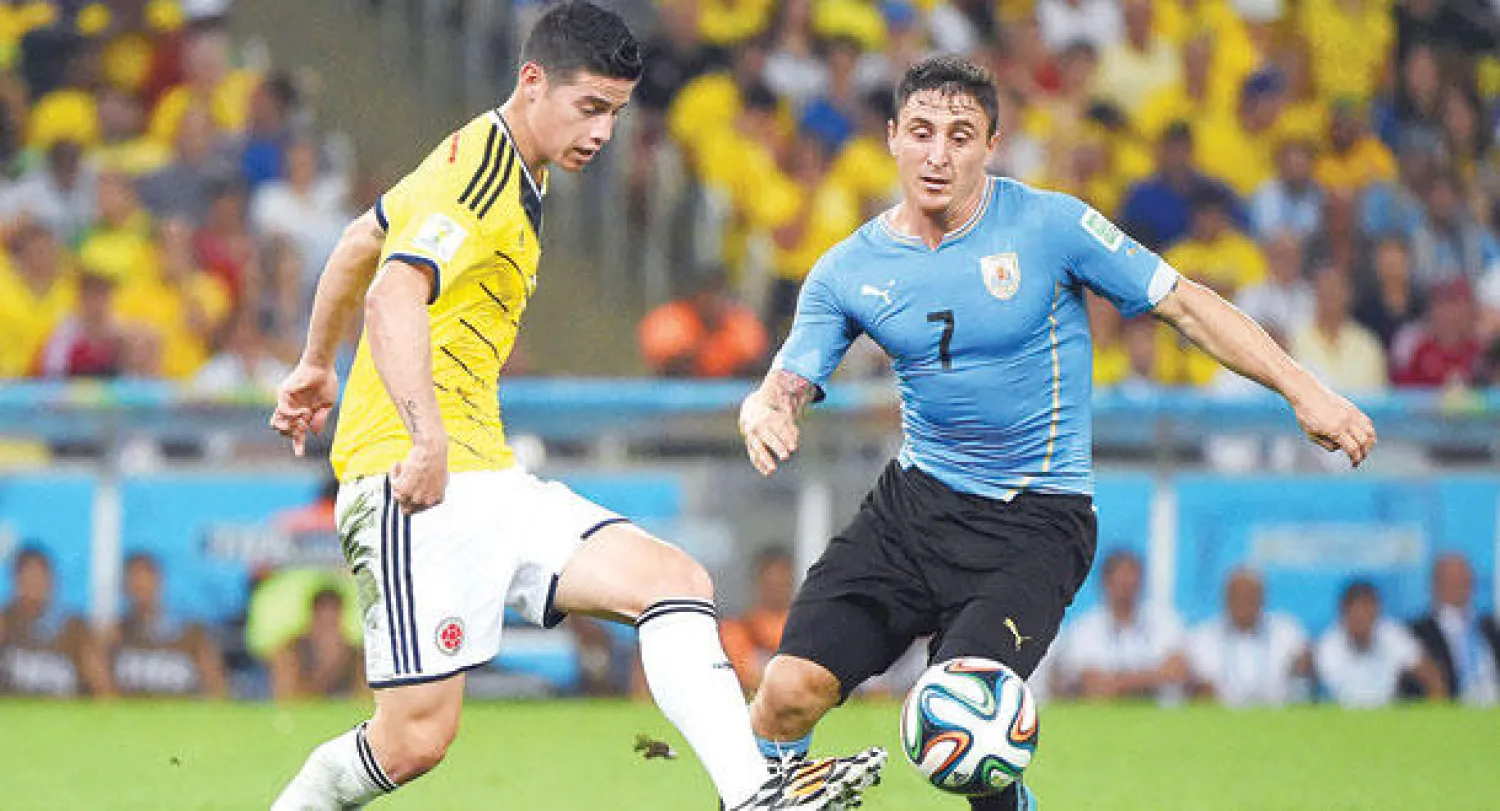 من مباراة كولومبيا وأوروغواي في دور الـ16 (أ.ف.ب)