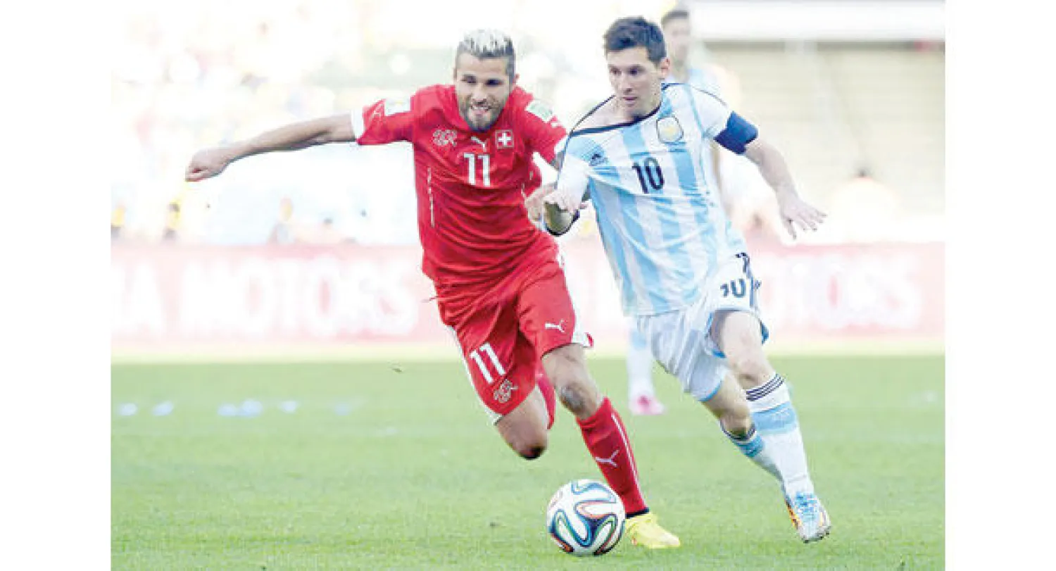 ميسي خلال مباراة الأرجنتين وسويسرا (أ.ف.ب)
