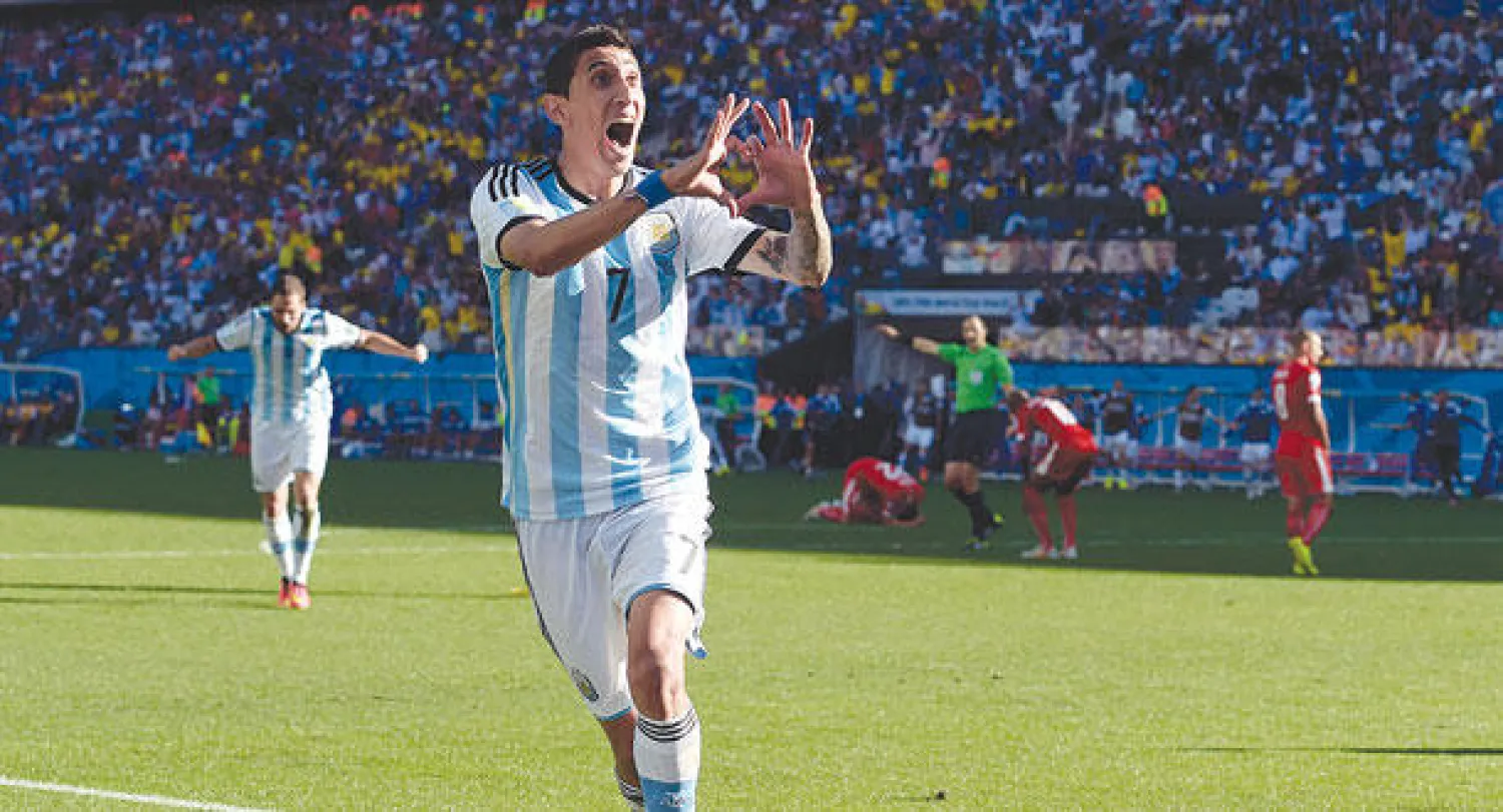 دي ماريا بعد إحرازه هدف الأرجنتين قبل دقيقتين فقط على انتهاء الوقت الإضافي (أ.ب)