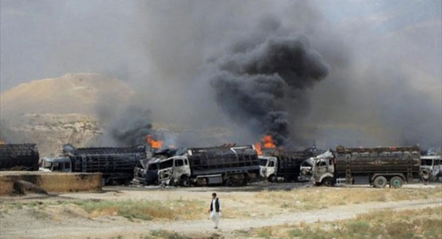طالبان تضرم النار في مائتي شاحنة تزود {الأطلسي} بالوقود