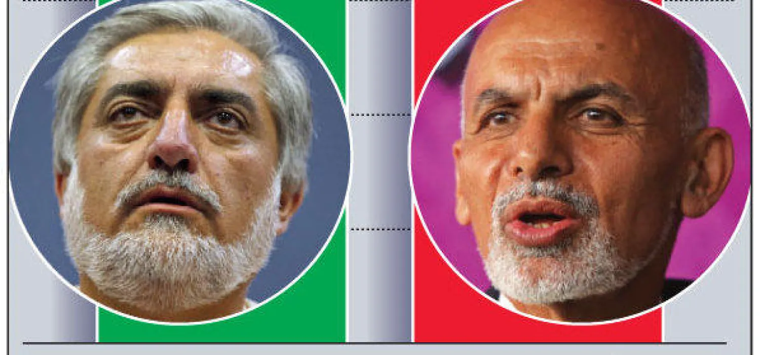 عبد الله يرفض نتائج انتخابات  الرئاسة الأفغانية.. وأنصاره يزيلون صور كرزاي