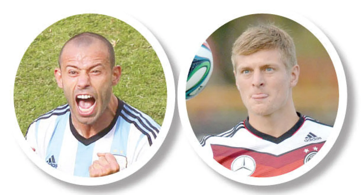 توني كروس  و خافيير ماسكيرانو (إ.ب.أ)