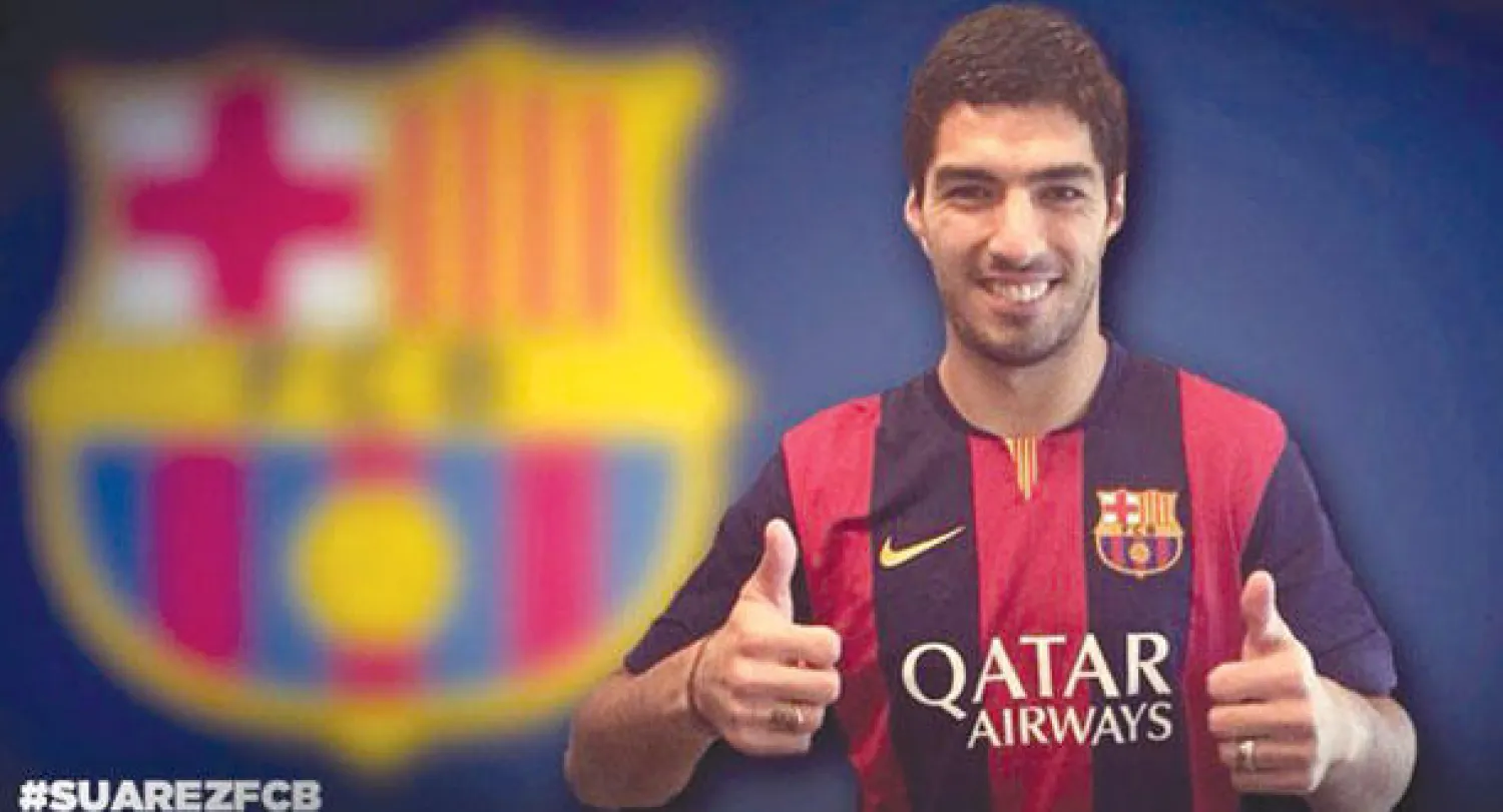 سواريز ارتدى قميص برشلونة للتصوير لكنه ممنوع من التدرب واللعب