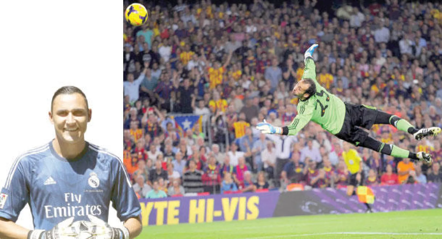 تألق الكوستاريكي لوبيز في مونديال البرازيل أدى إلى تهافت الكثيرين عليه  -  نافاس بقميص ريال مدريد أمس (إ.ب.أ)