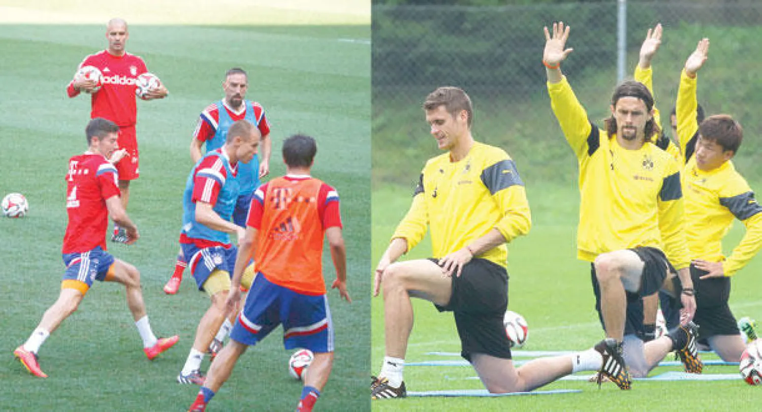 دورتموند يستعد للسوبر الثاني على التوالي (إ.ب.أ)   -  بايرن في مهمة ثأرية (إ.ب.أ)