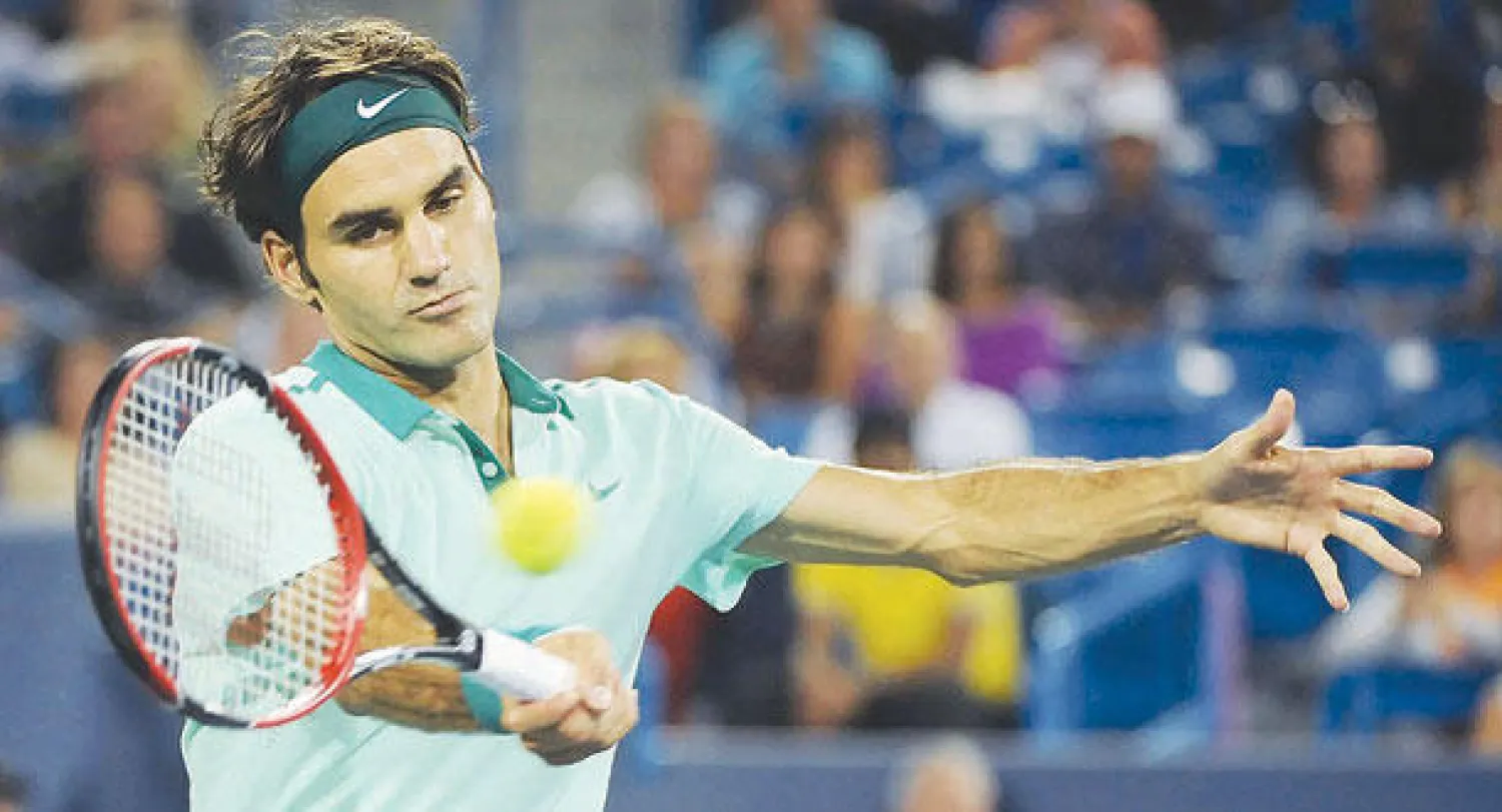 فيدرر في مباراته أمس أمام الكندي راونيتش