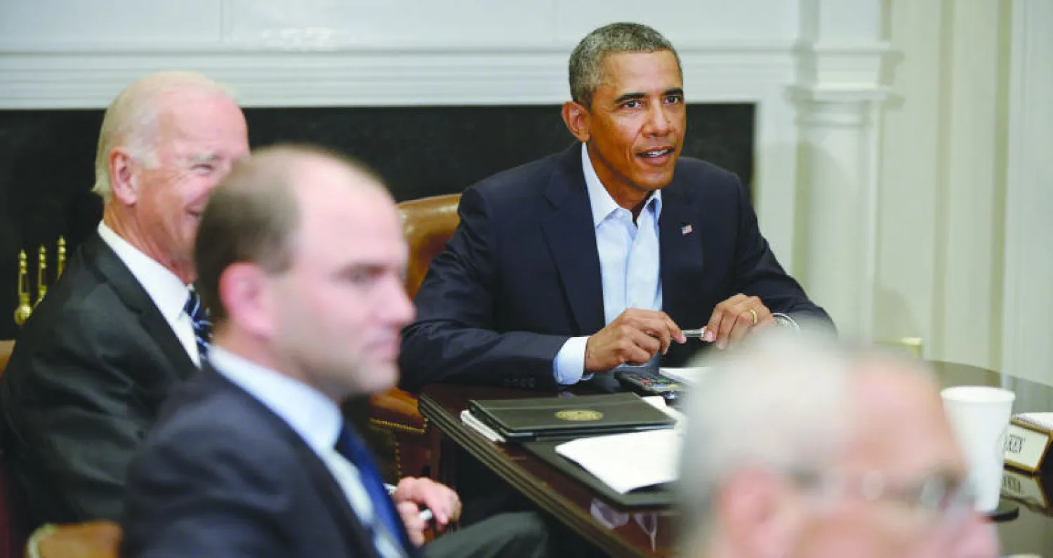 الرئيس الأميركي باراك أوباما لدى اجتماعه بأعضاء مجلس الأمن القومي في البيت الأبيض أمس لبحث الوضع في العراق (إ.ب.أ)