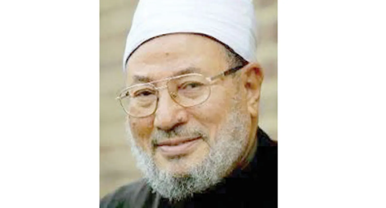 القرضاوي: الله والملائكة مع إردوغان