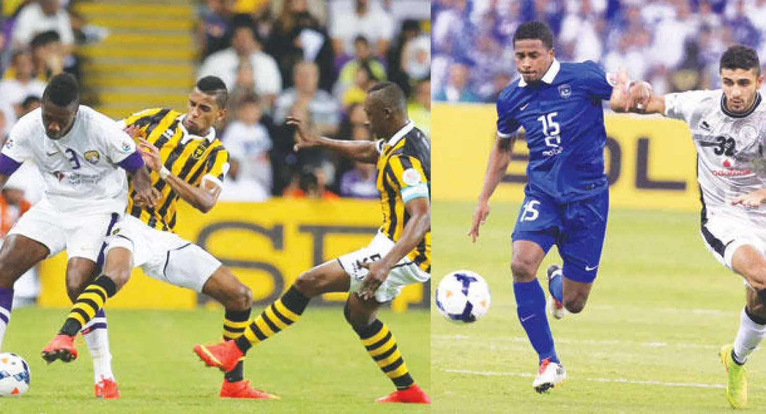 جانب من المواجهة التي جمعت الهلال والسد القطري في الرياض (تصوير: سعد العنزي)  -  من مباراة الاتحاد والعين الإماراتي أمس (تصوير: عدنان مهدلي)