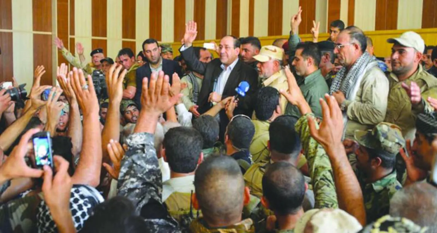 صورة من موقع رئيس الوزراء العراقي المنتهية ولايته نوري المالكي وهو يزور أمس بلدة آمرلي