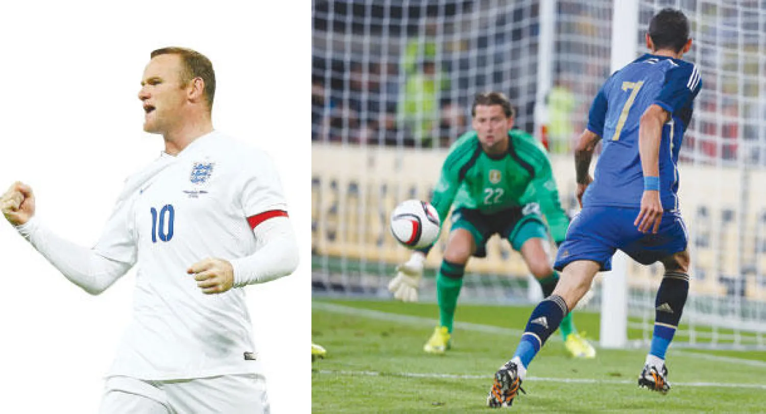 دي ماريا نجم الأرجنتين يسدد نحو مرمى ألمانيا (أ.ب)   -  روني يحتفل بهدفه في أول مشاركة لقائد لمنتخب إنجلترا (رويترز)