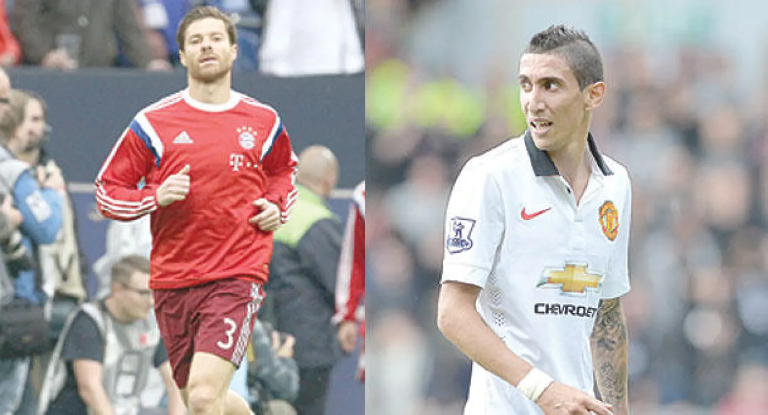 دي ماريا في مانشستر يونايتد (إ.ب.أ)  -  ألونسو في بايرن ميونيخ (أ.ف.ب)