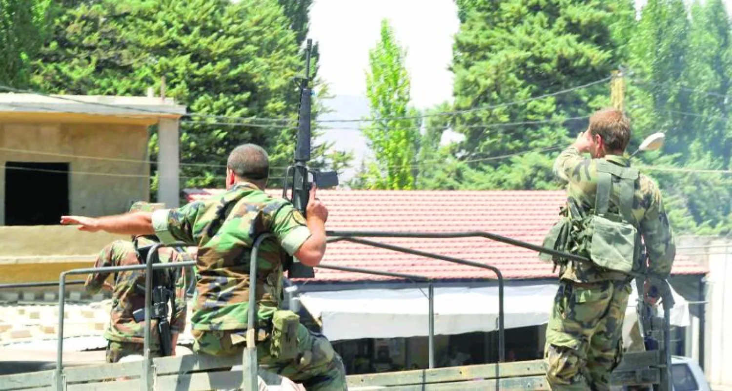 إجراءات أمنية مشددة في محيط بلدة عرسال (رويترز)