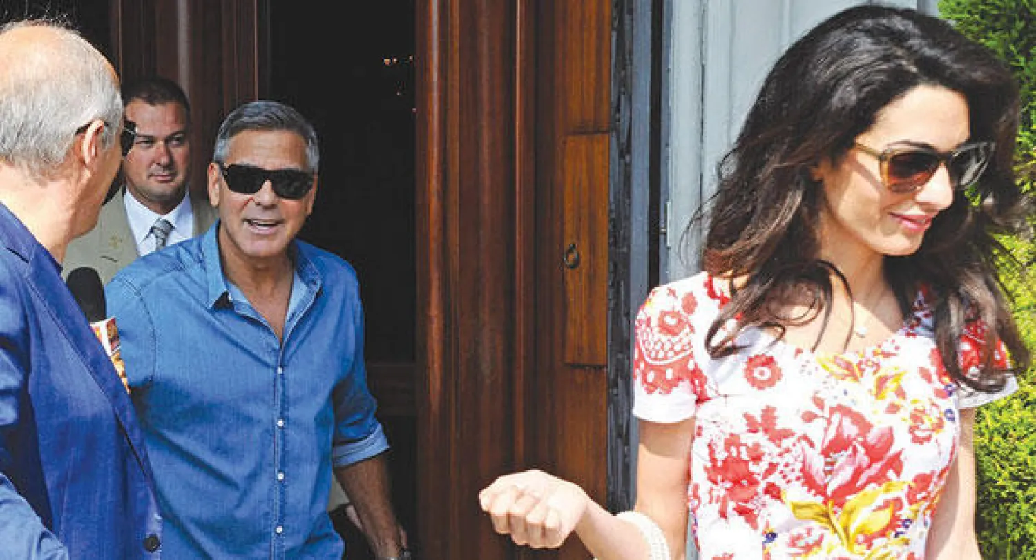 فستان عرس خطيبة كلوني من دار أزياء ألكسندر ماكوين