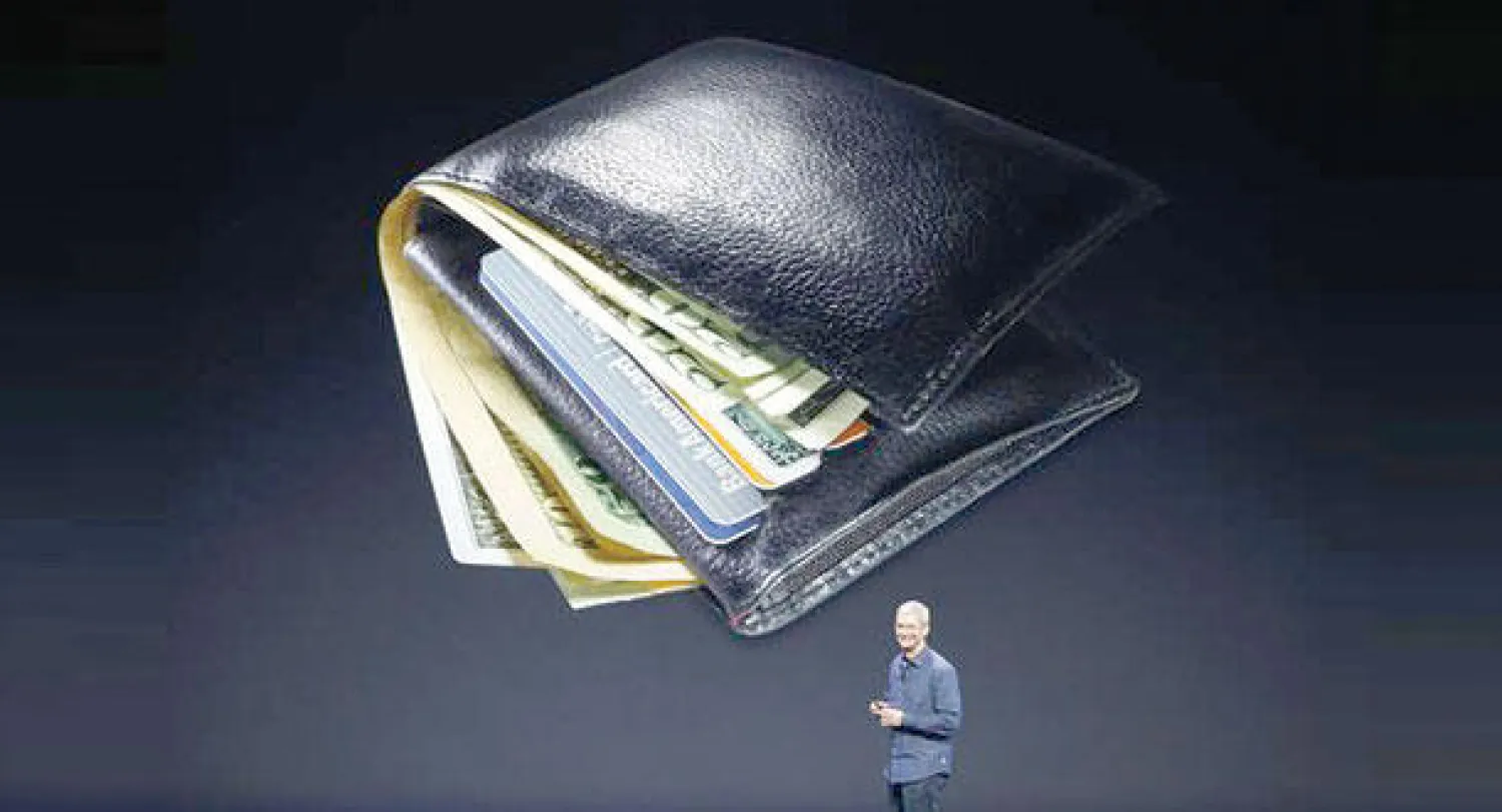 تيم كوك الرئيس التنفيذي لشركة أبل يتحدث عن خدمة «أبل باي» للدفع (رويترز)