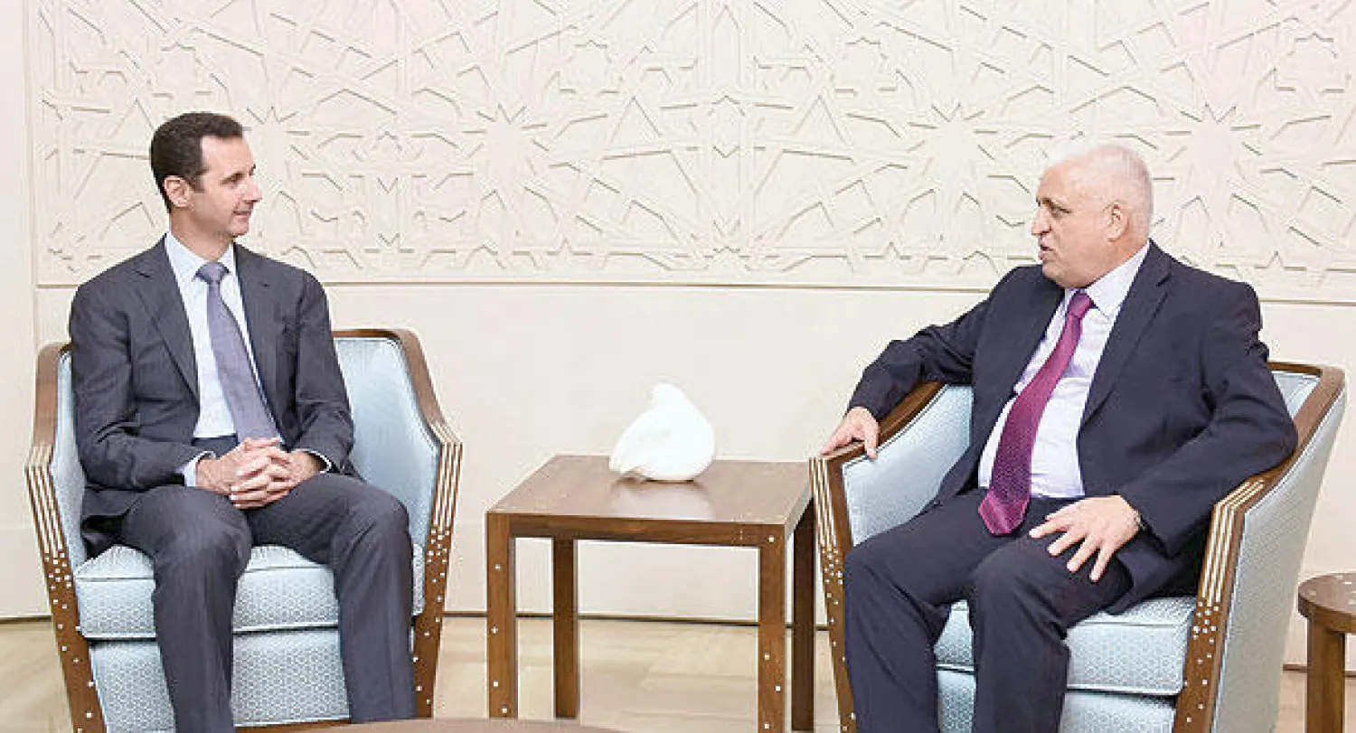 صورة وزعتها وكالة الأنباء السورية (سانا) للرئيس السوري بشار الأسد لدى استقباله مستشار الأمن الوطني العراقي فالح الفياض أمس