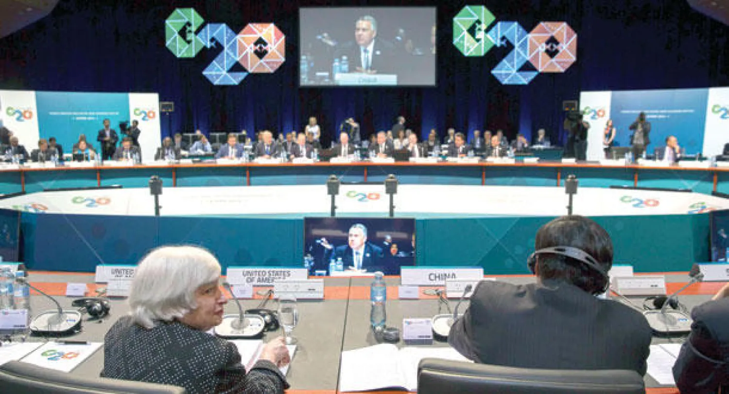 وزراء مالية  دول مجموعة العشرين خلال اجتماعهم في مدينة كيرنز الاسترالية أمس (رويترز)