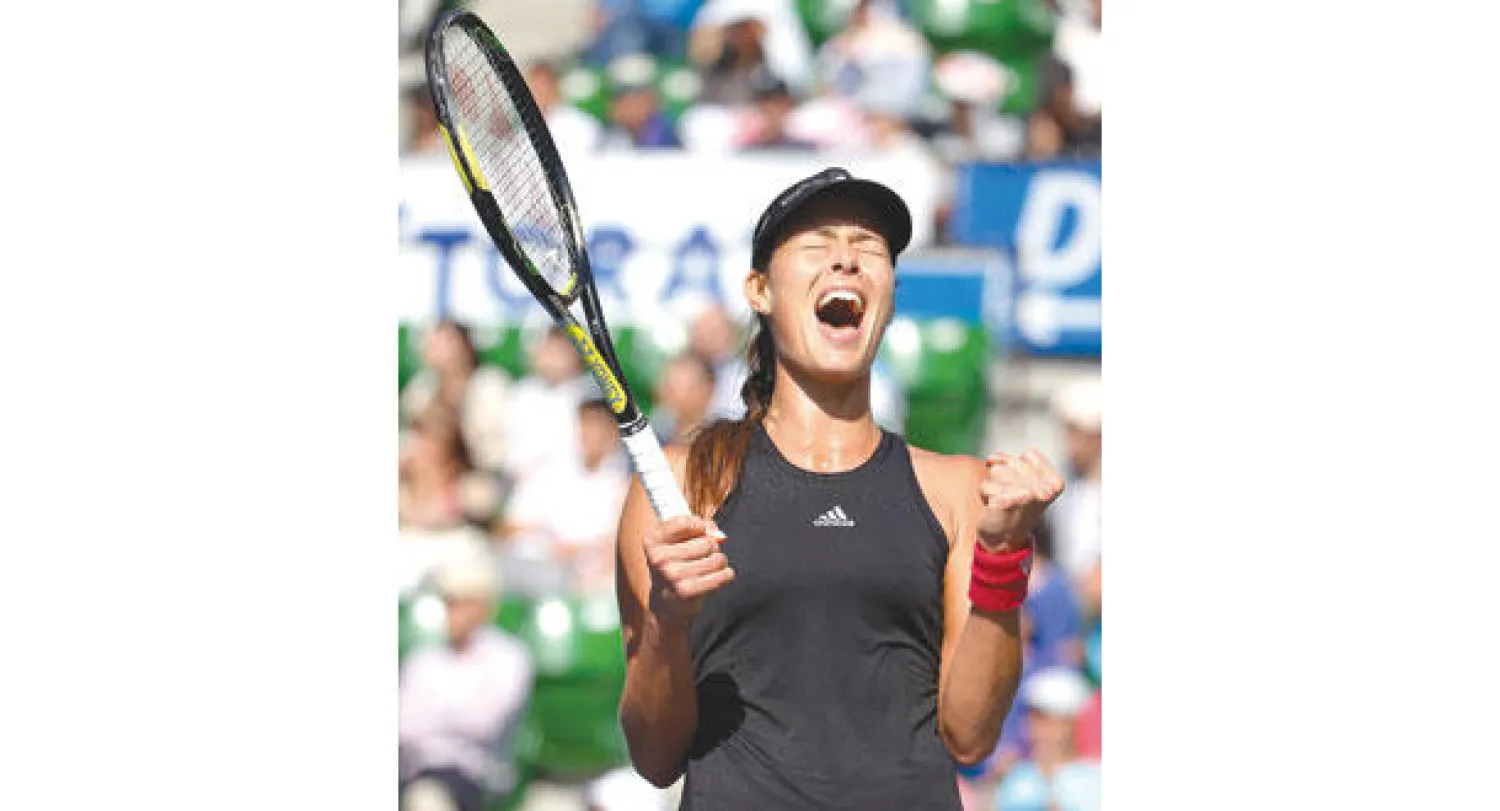 إيفانوفيتش تحتفل بفوزها ببطولة طوكيو (أ.ب)