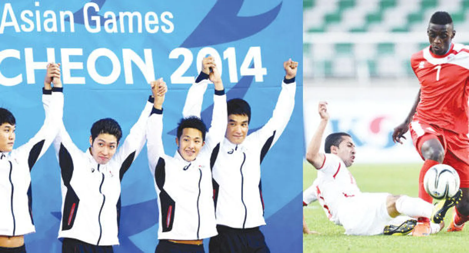 جانب من مباراة الإمارات والأردن   -  سباحو المنتخب الياباني رسموا إبداعاتهم في الآسياد