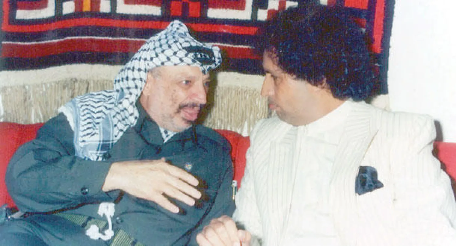 قذاف الدم مع الرئيس الراحل ياسر عرفات في سنواته الأخيرة