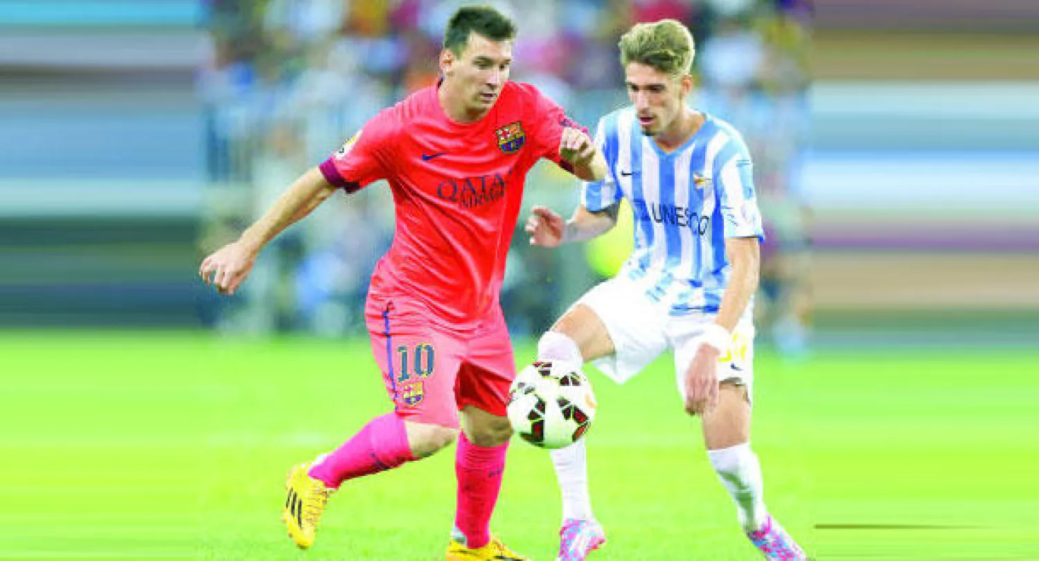 ميسي لم يظهر بمستواه المعهود أمام ملقة (إ.ب.أ)