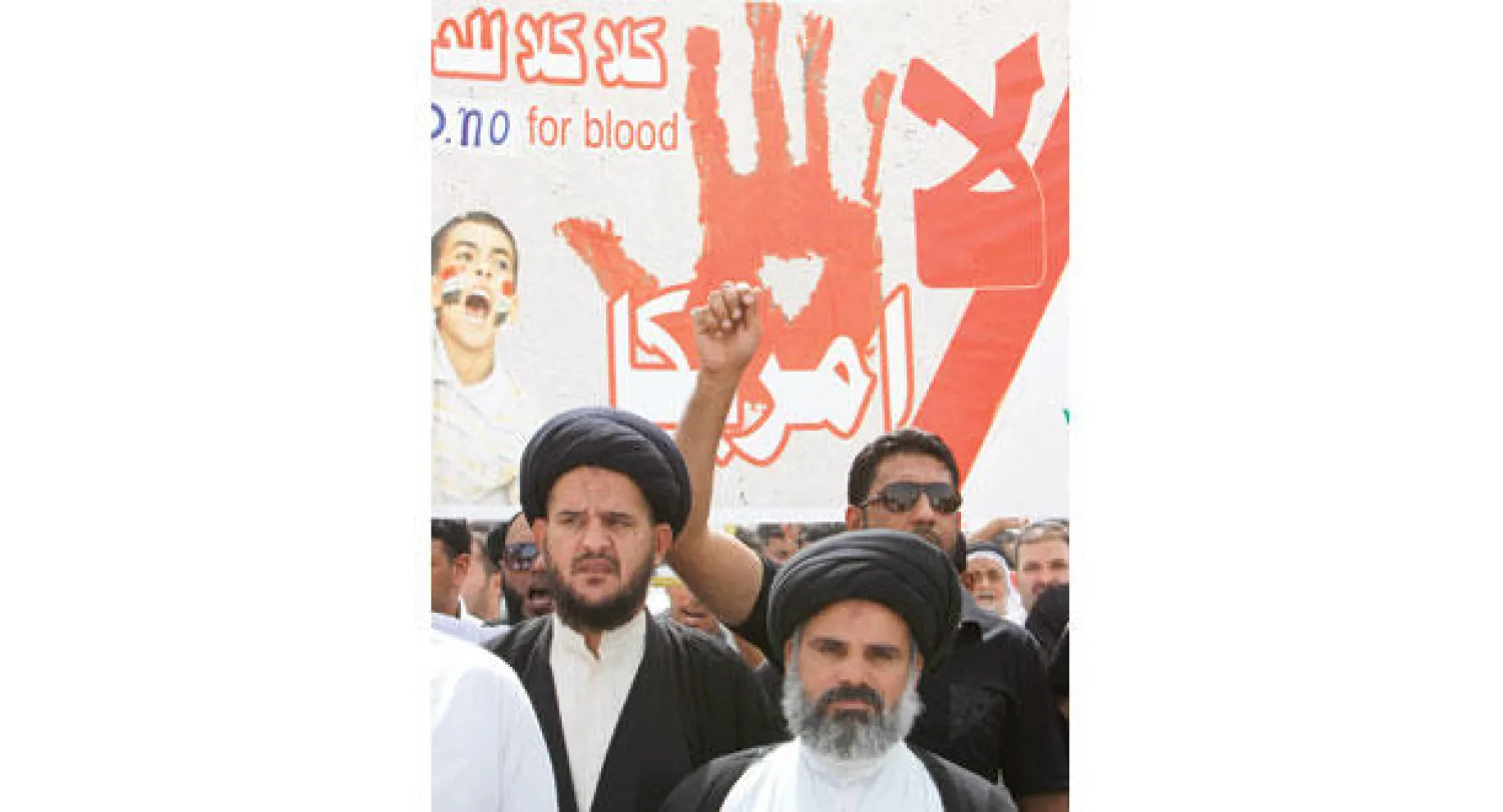 مؤيدون لمقتدى الصدر يتظاهرون في البصرة أمس ضد الوجود العسكري الأميركي في البلاد (رويترز)