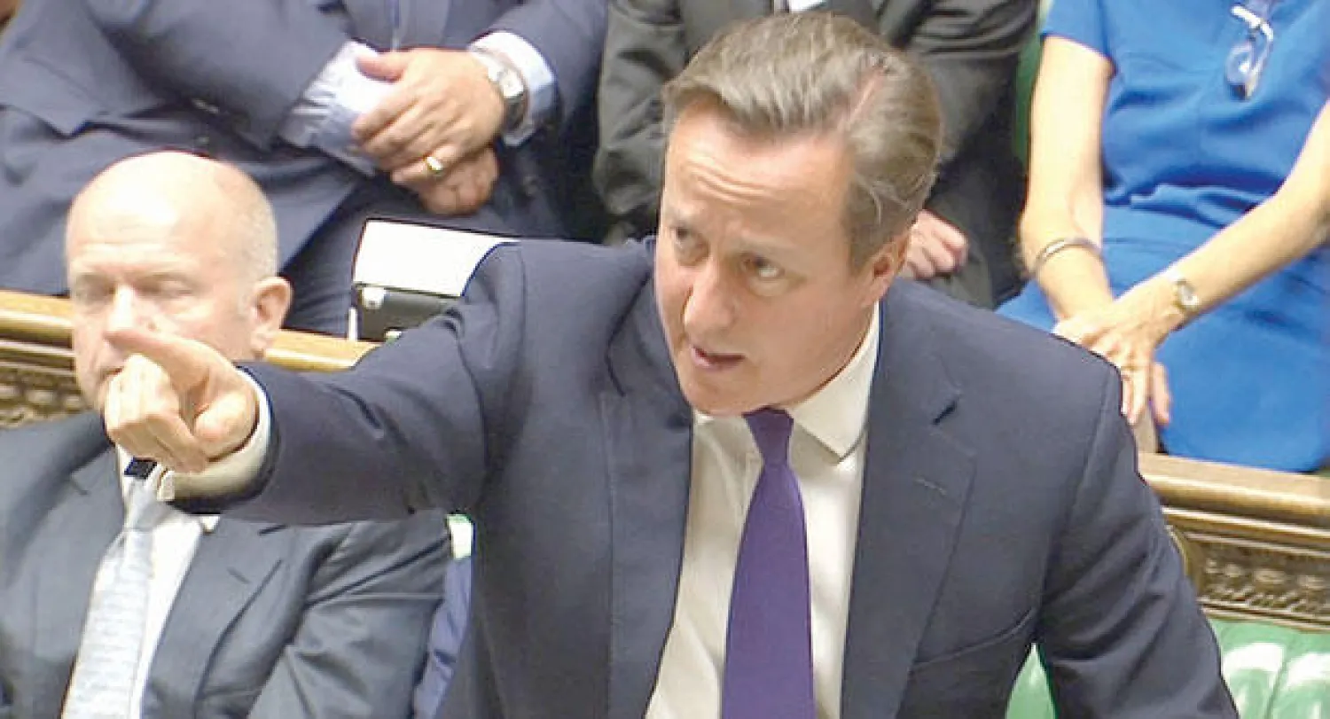 رئيس الوزراء البريطاني ديفيد كاميرون يدعو أمام مجلس العموم أمس إلى انضمام بلاده لمحاربة تنظيم {داعش} في العراق (رويترز)