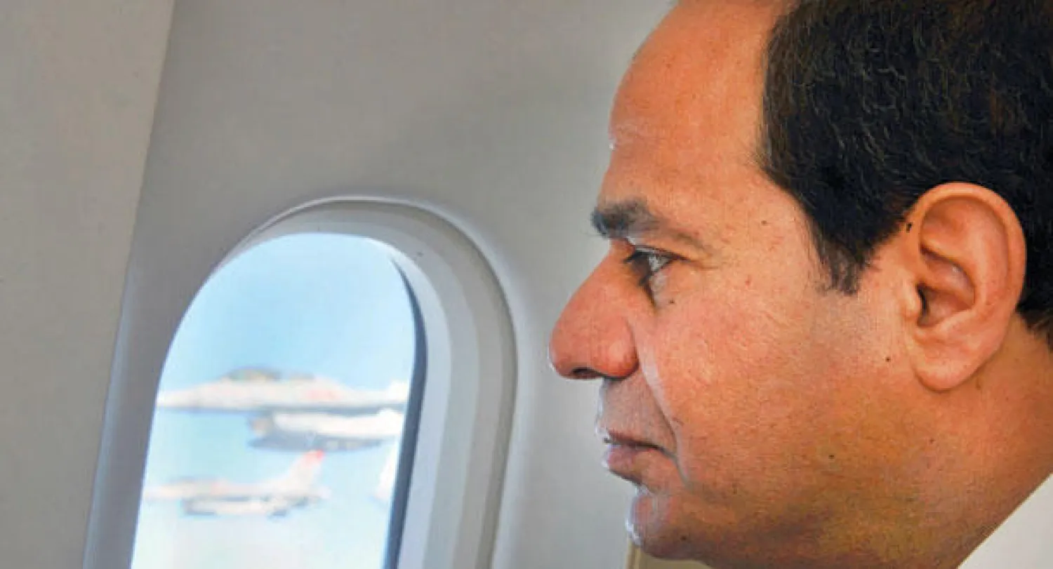 الرئيس السيسي في طريق عودته إلى القاهرة (أ.ب)