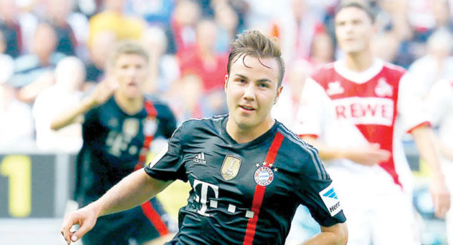 غوتزة يحتفل بهدفه في مرمى كولن «رويترز»