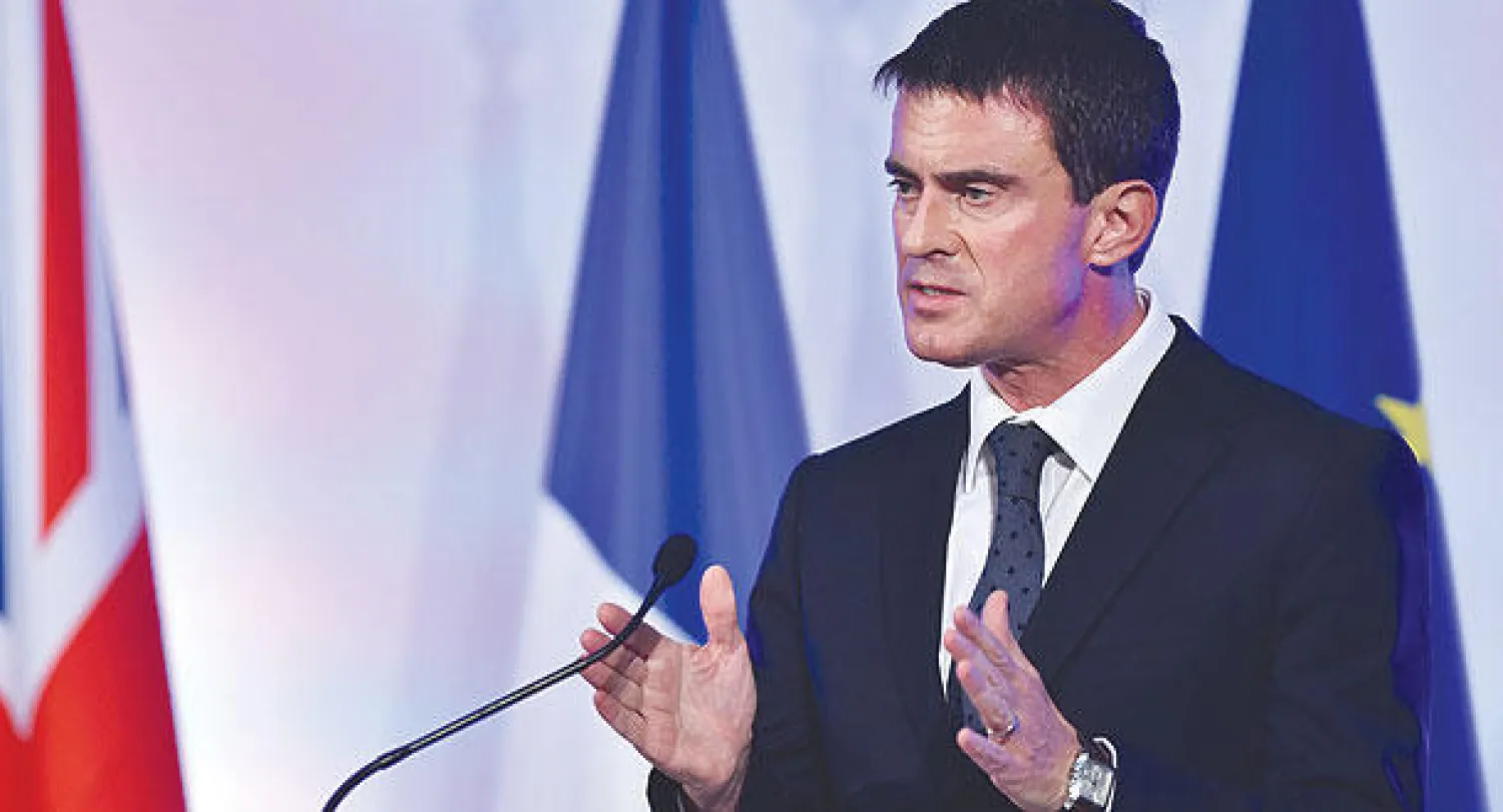 رئيس الوزراء الفرنسي  مانويل فالس في لندن (أ.ف.ب)