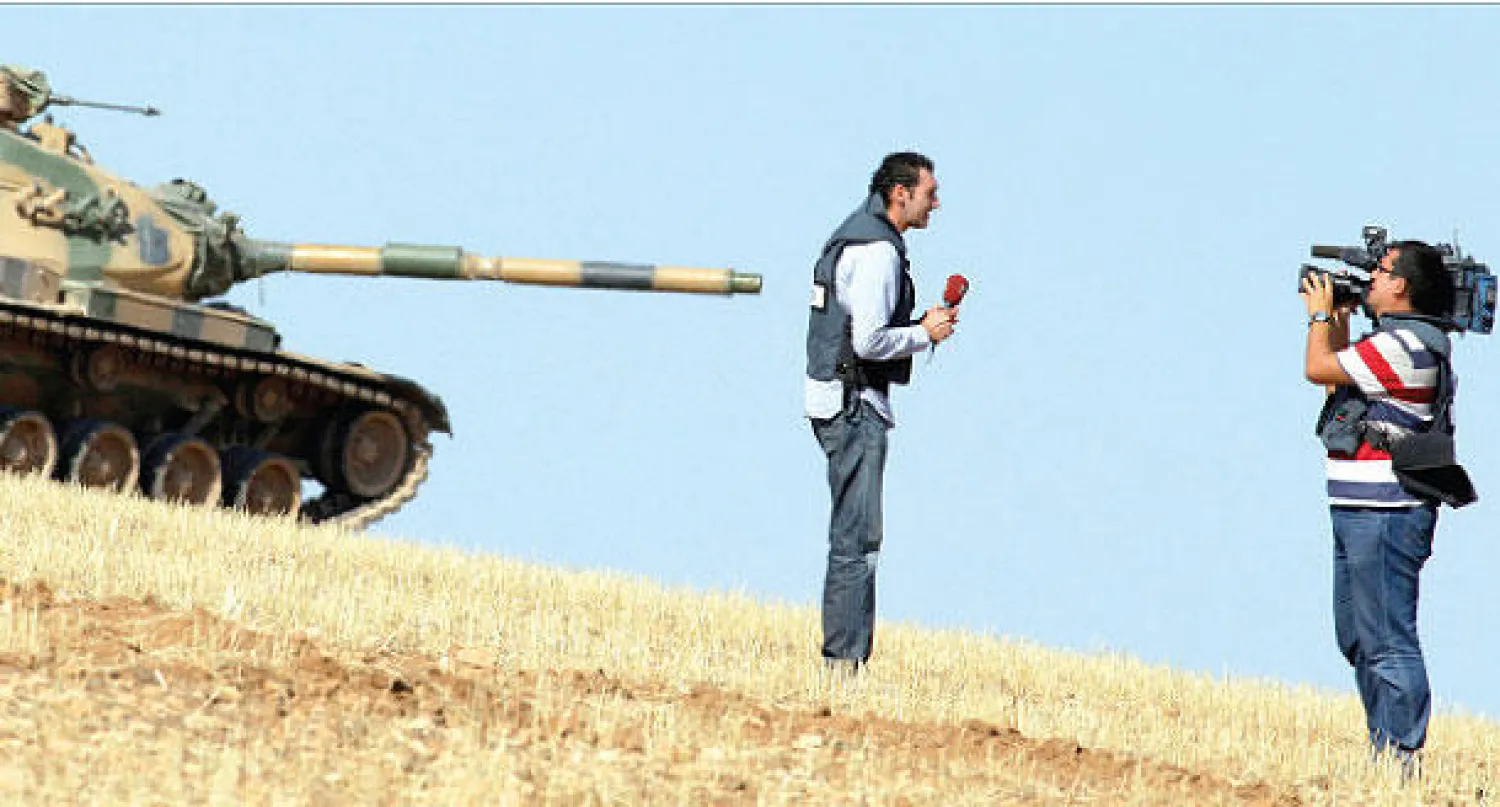 العمل الصحافي تحت مظلة «داعش» يخضع للمراقبة المستمرة ويبدأ بمبايعة البغدادي والالتزام بأوامره ونواهيه (أ.ب)