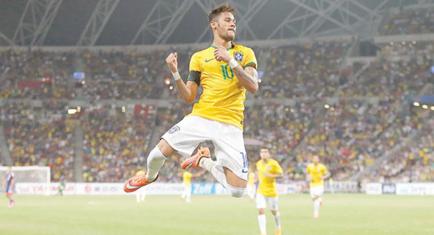 نيمار تفوق على نفسه في المنتخب البرازيلي ومع برشلونة (أ.ب)