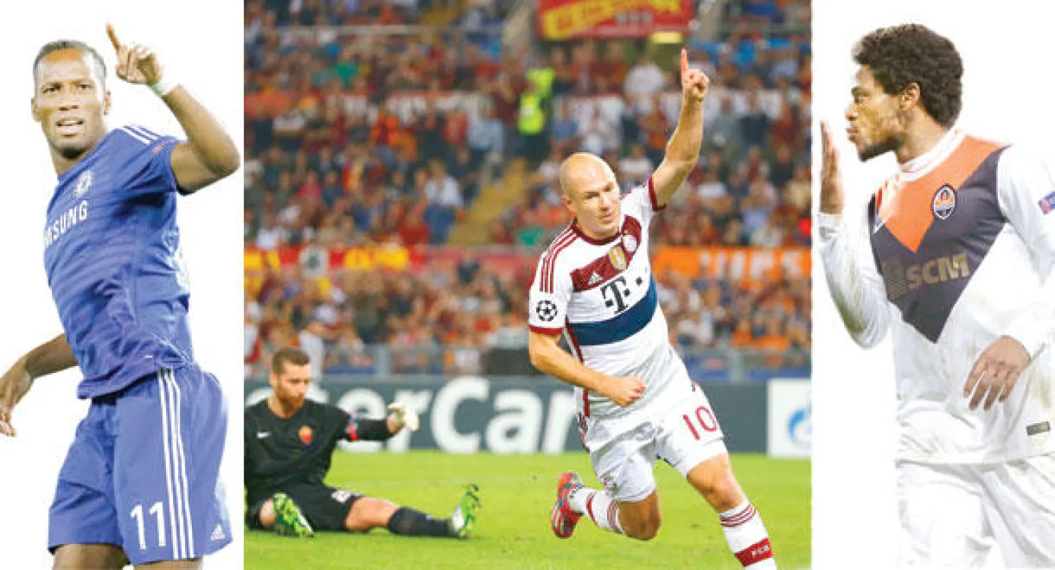 أدريانو مهاجم شاختار حقق أسرع رباعية في مرمى باتي (أ.ب)  -  روبين نجم بايرن ميونيخ يحتفل بعد أن سجل مرتين في شباك روما (رويترز)  -  دروغبا عاد للتألق وسجل هدفا لتشيلسي (أ.ب)