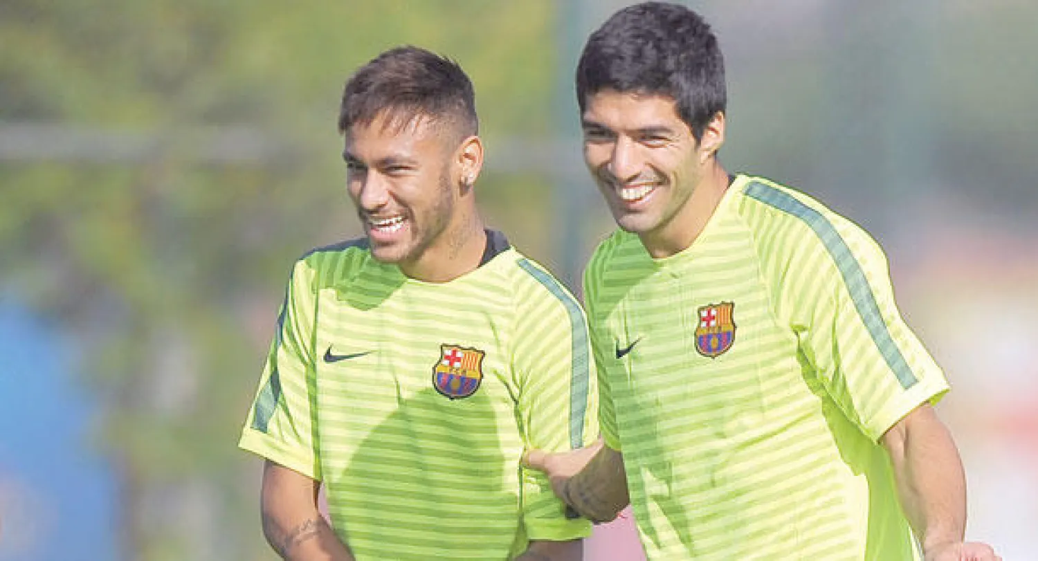 سواريز ونيمار يستعدان لمواجهة ريال مدريد (أ.ب)