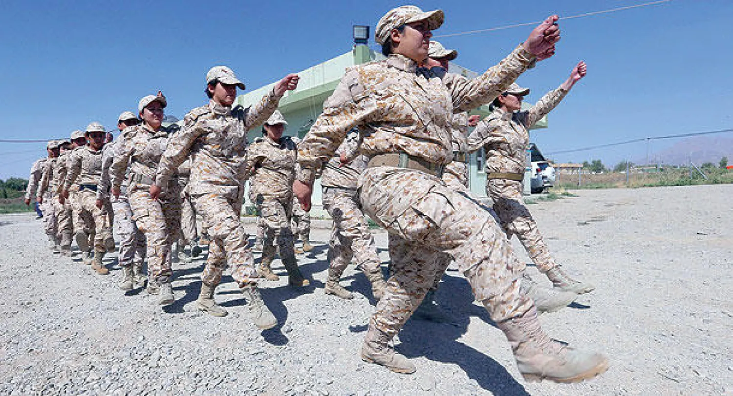 مقاتلات من البيشمركة أثناء عمليات تدريبية في قاعدة عسكرية شمال العراق (صورة أرشيفية) (إ.ب.أ)