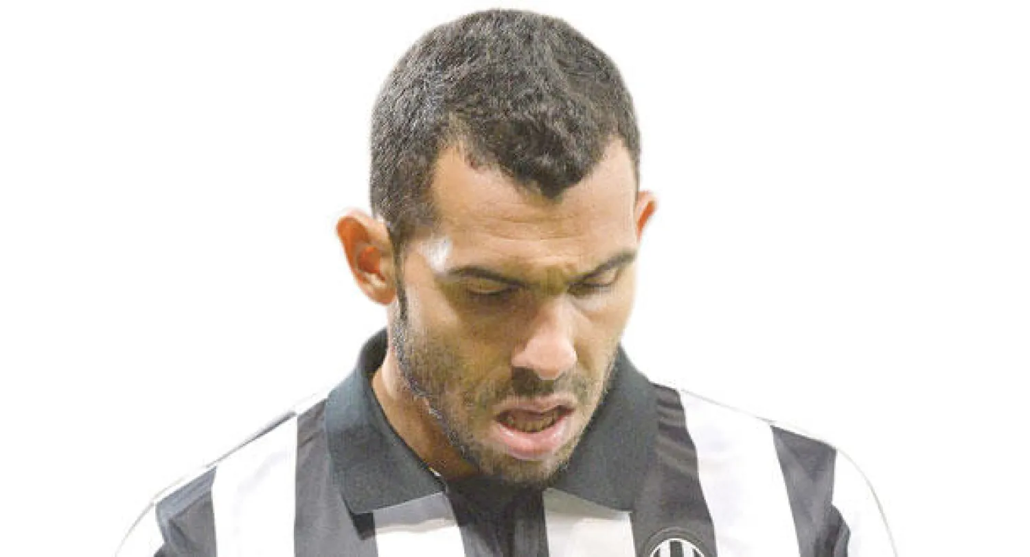 تيفيز بعد هزيمة يوفنتوس (إ.ب.أ)