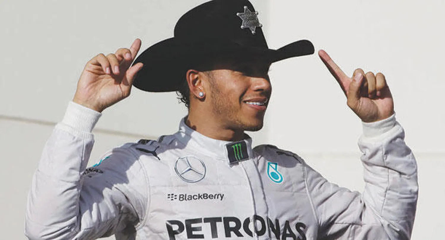 هاميلتون يحتفل على الطريقة الأميركية (أ.ب)