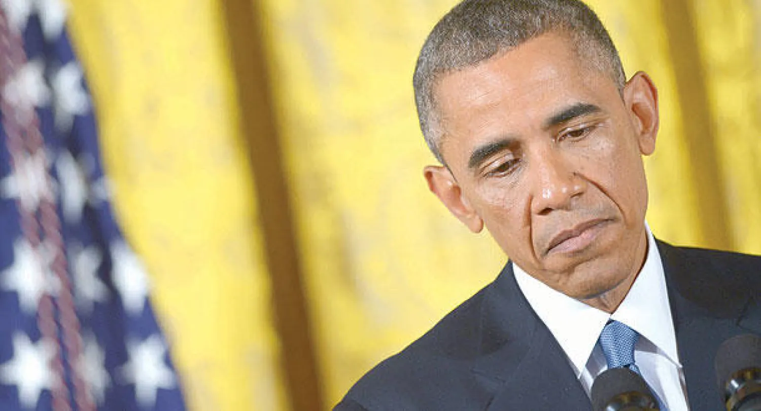 الرئيس الأميركي باراك أوباما خلال مؤتمر صحافي في البيت الأبيض أمس (أ.ف.ب)