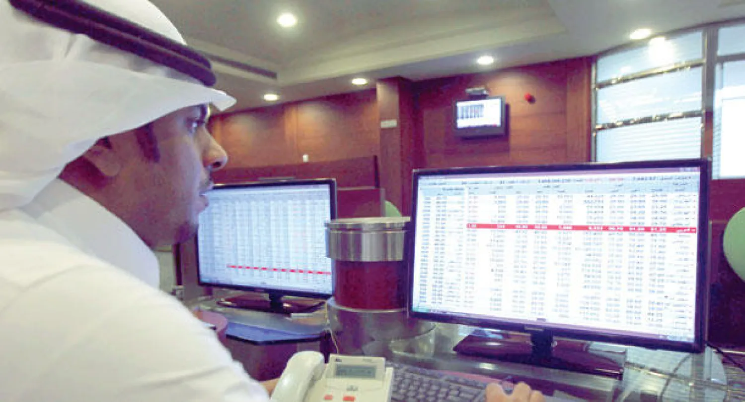 أحد  المتداولين في سوق الأسهم السعودية («الشرق الأوسط»)