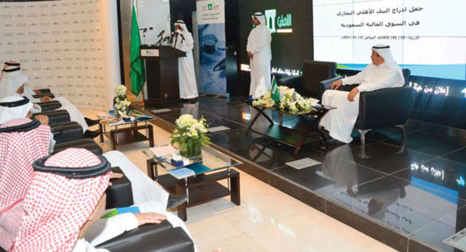 جانب من حفل إدراج سهم البنك الأهلي على مؤشر «تداول» («الشرق الأوسط»)