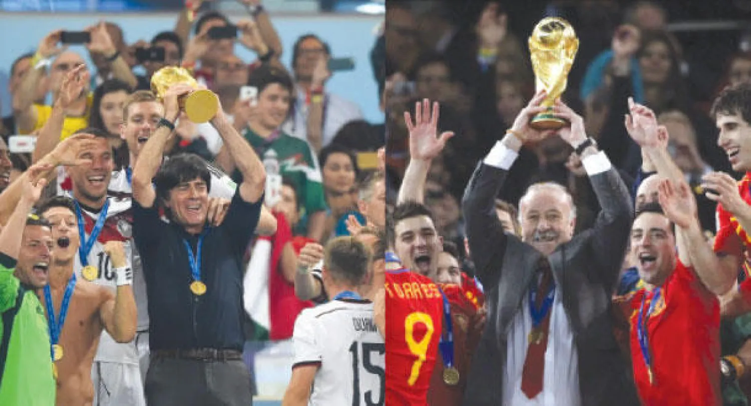 دل بوسكي بطل مونديال 2010   -   لوف بطل مونديال 2014